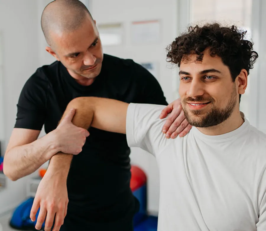 ICA occupational therapist fitting a patient with a custom hand splint