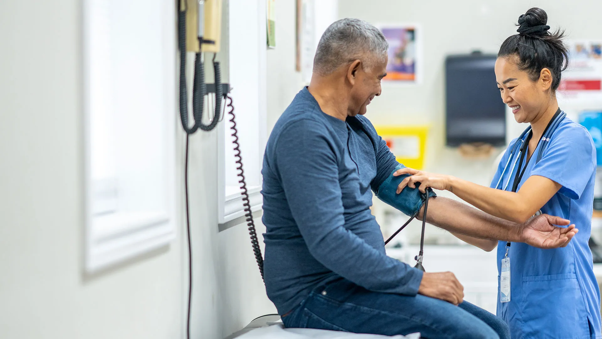 Clinician and patient at an Injury Care Associates clinic in the Denver metro