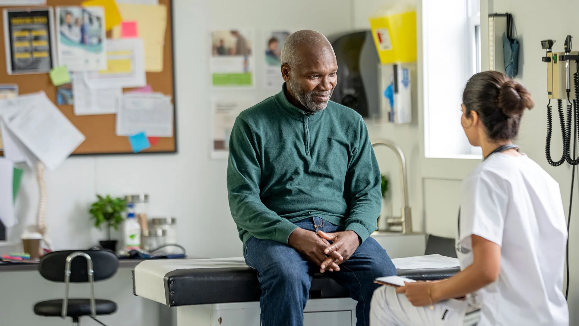 Clinician and patient at an Injury Care Associates clinic in the Denver metro