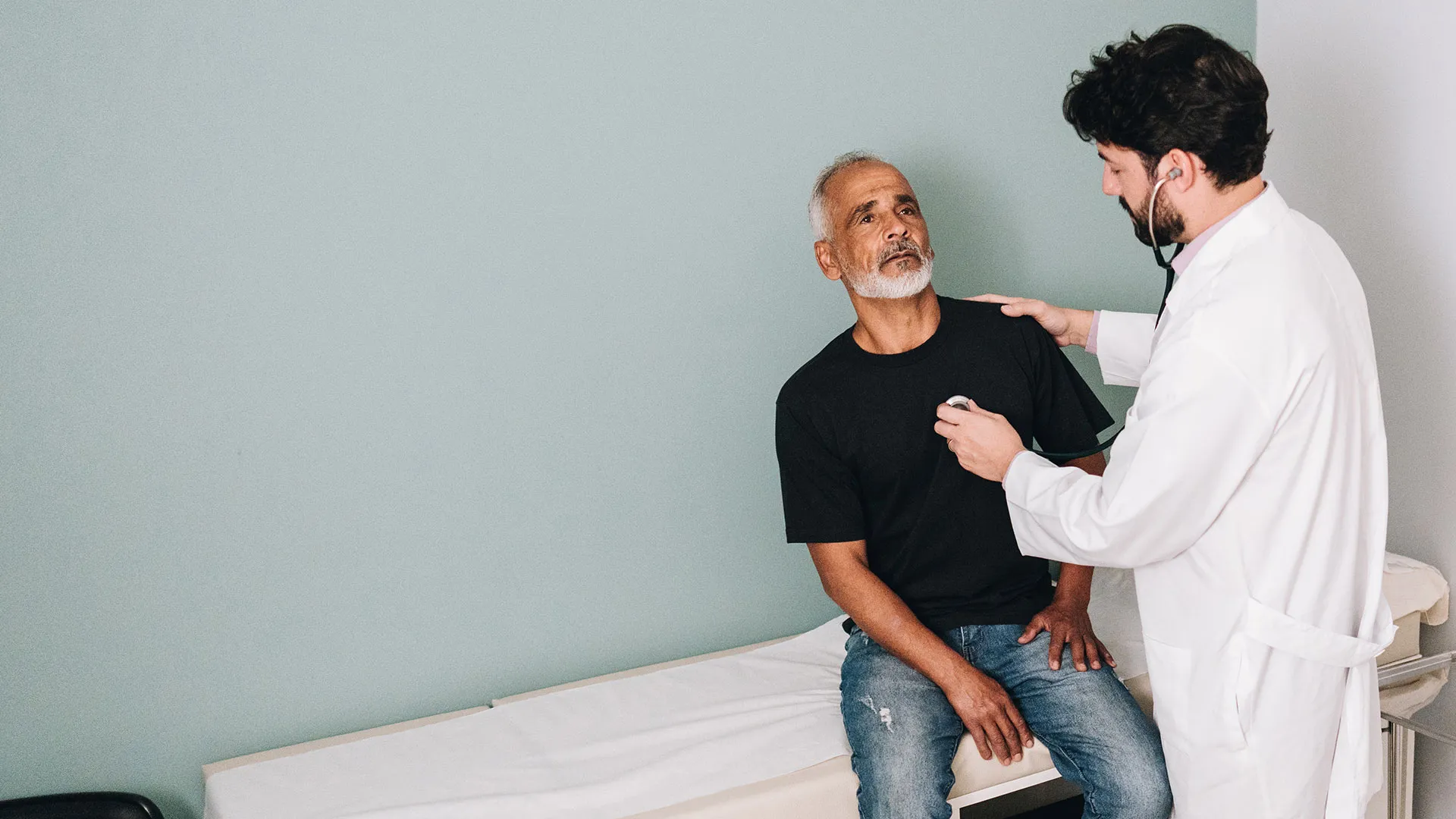 Clinician and patient at an Injury Care Associates clinic in the Denver metro