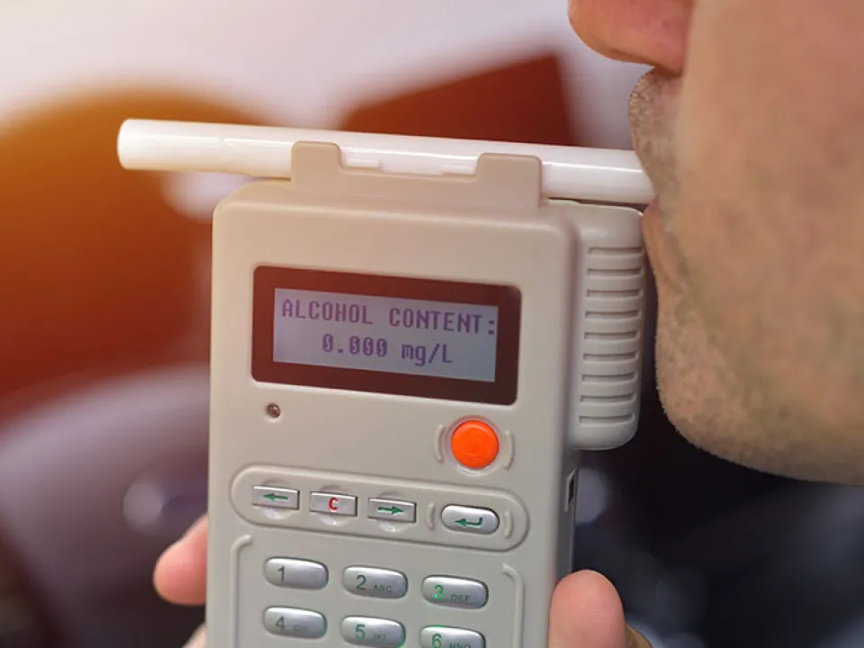 Certified collector completing chain-of-custody paperwork at a construction site