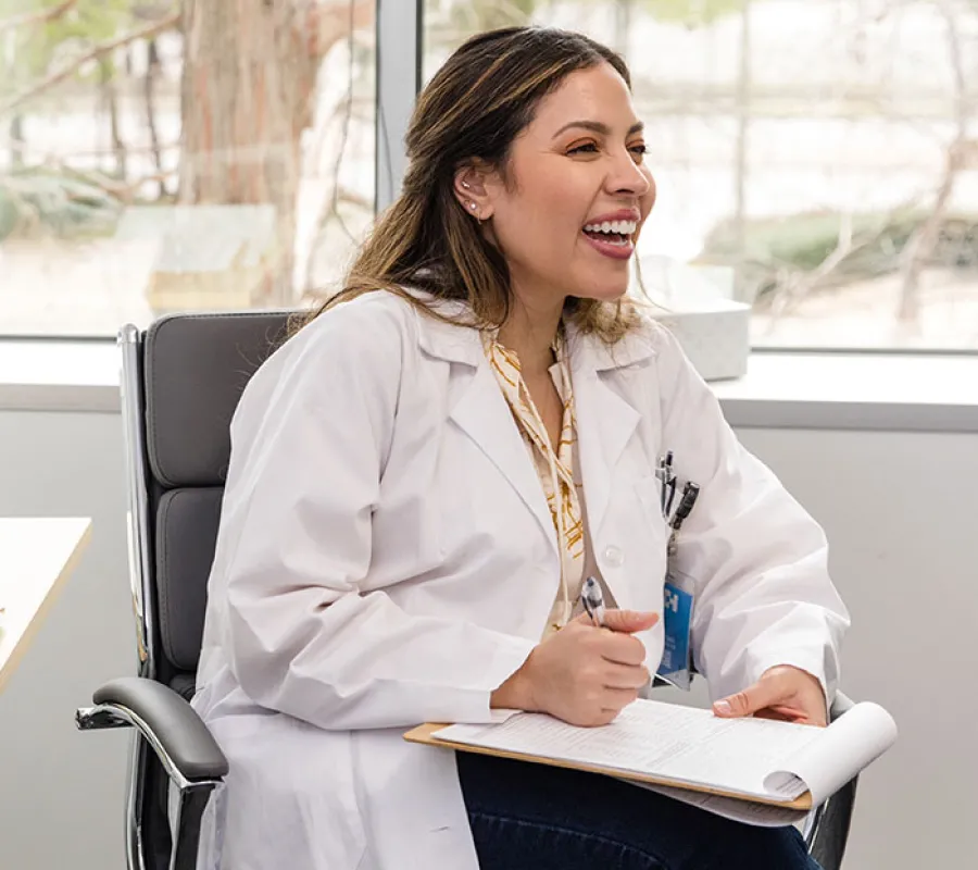 ICA account manager reviewing a drug-testing protocol with an employer's HR lead