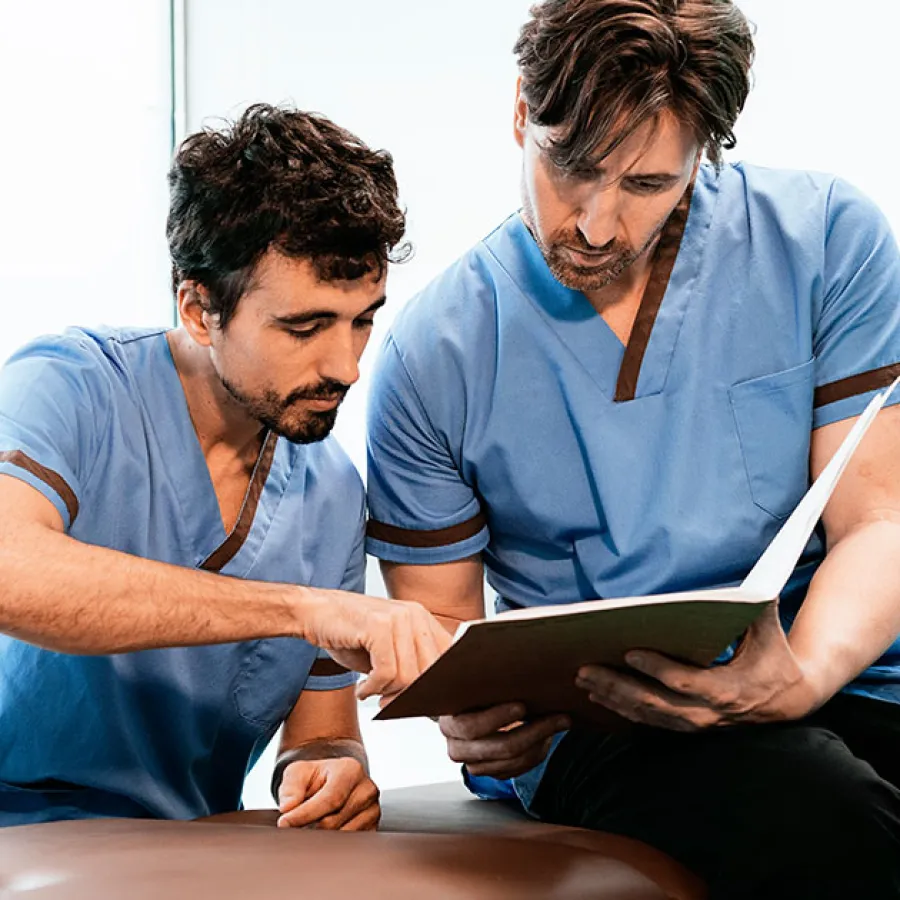 Therapist reviewing a job description before an FCE